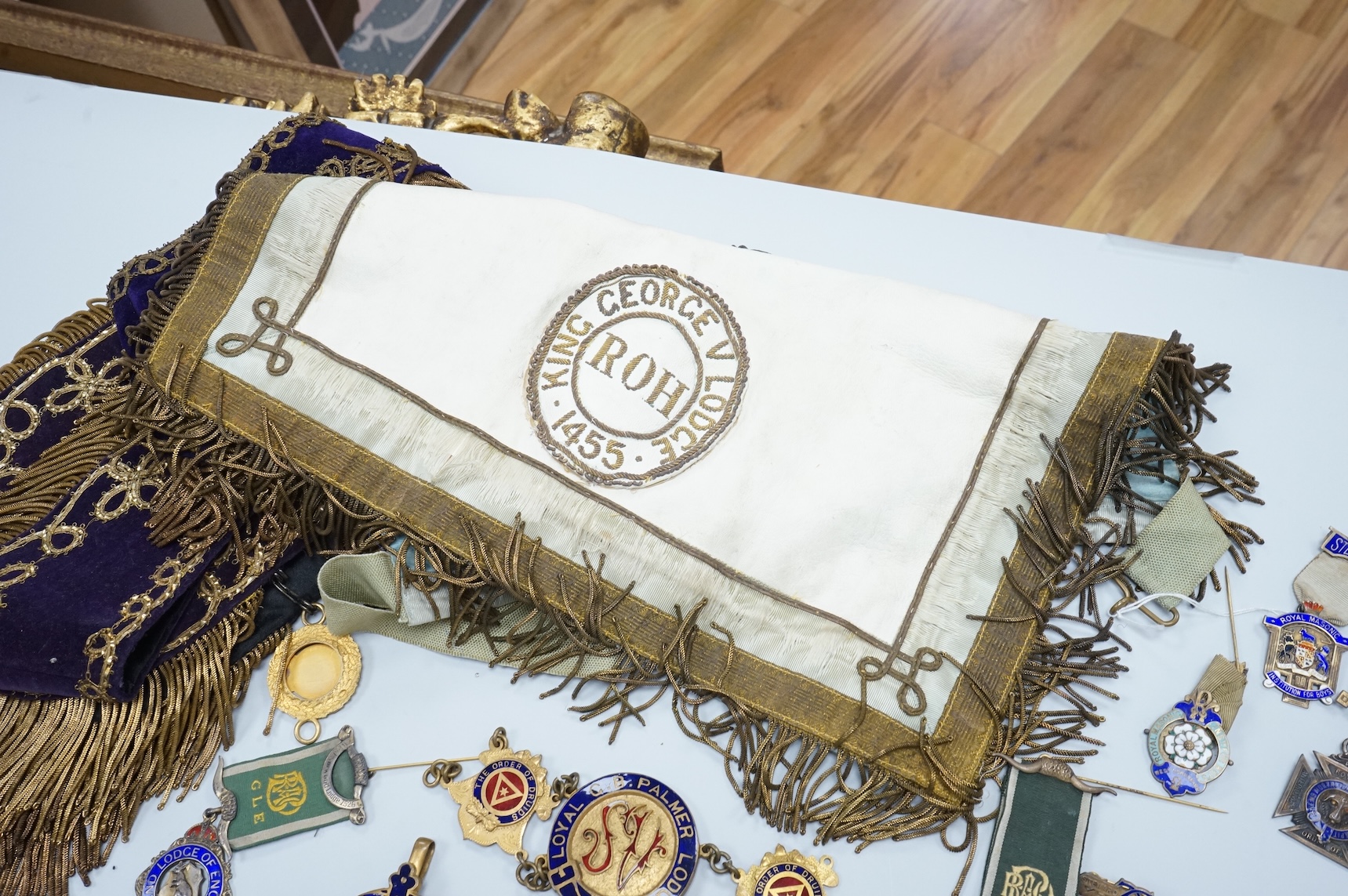 A group of Masonic medals, ‘jewels’ many enamelled and sashes, together with an early 19th century certificate
